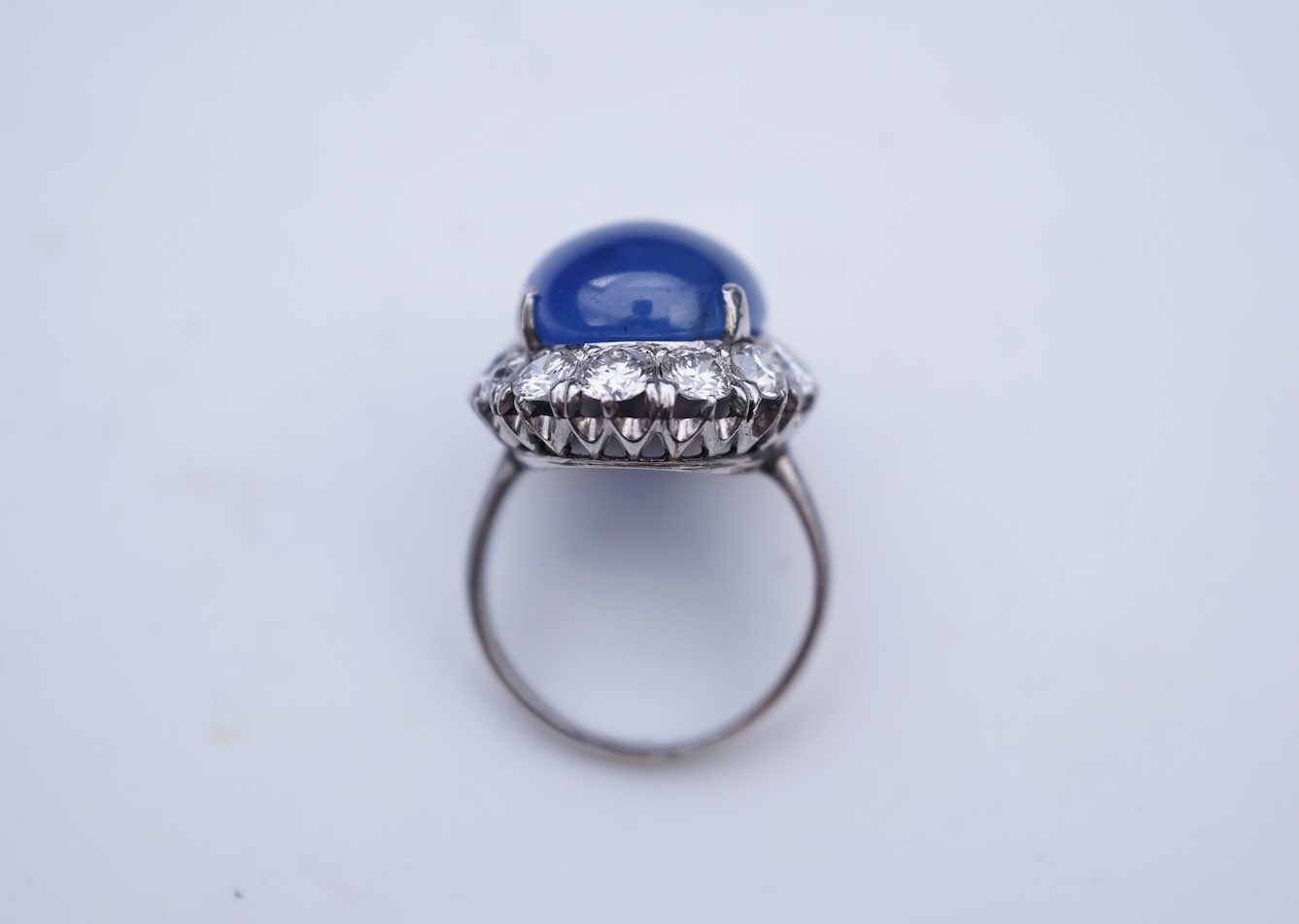 A sapphire and diamond ring, mid 20th century